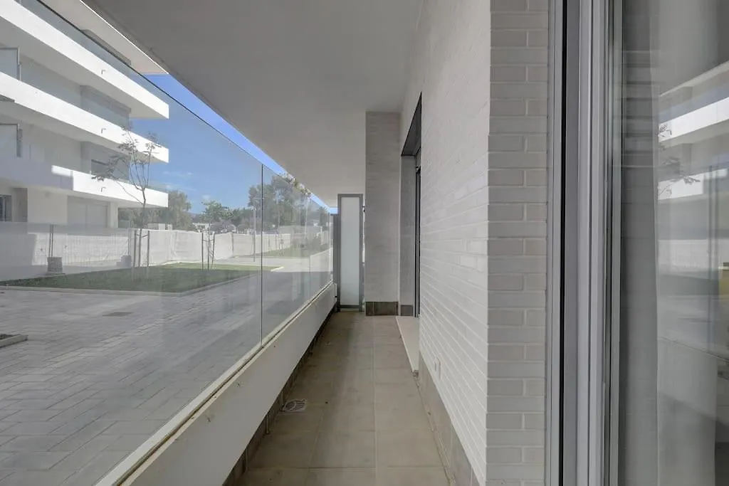 Brand New Modern Ground Floor Apartment In Marbella With Rooftop Pool And Gym
