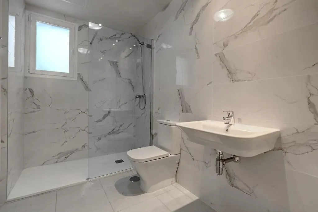 Brand New Modern Ground Floor Apartment In Marbella With Rooftop Pool And Gym